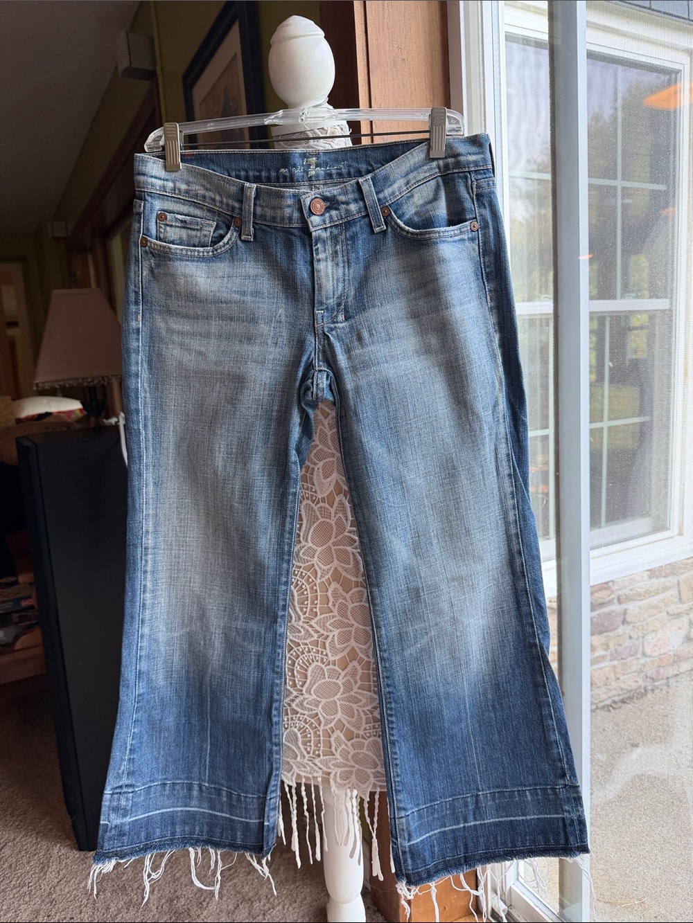 7 For All Mankind Light Blue Wide-Leg Jeans with Frayed Hem